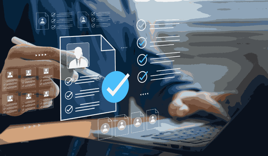 Man on computer with floating tech