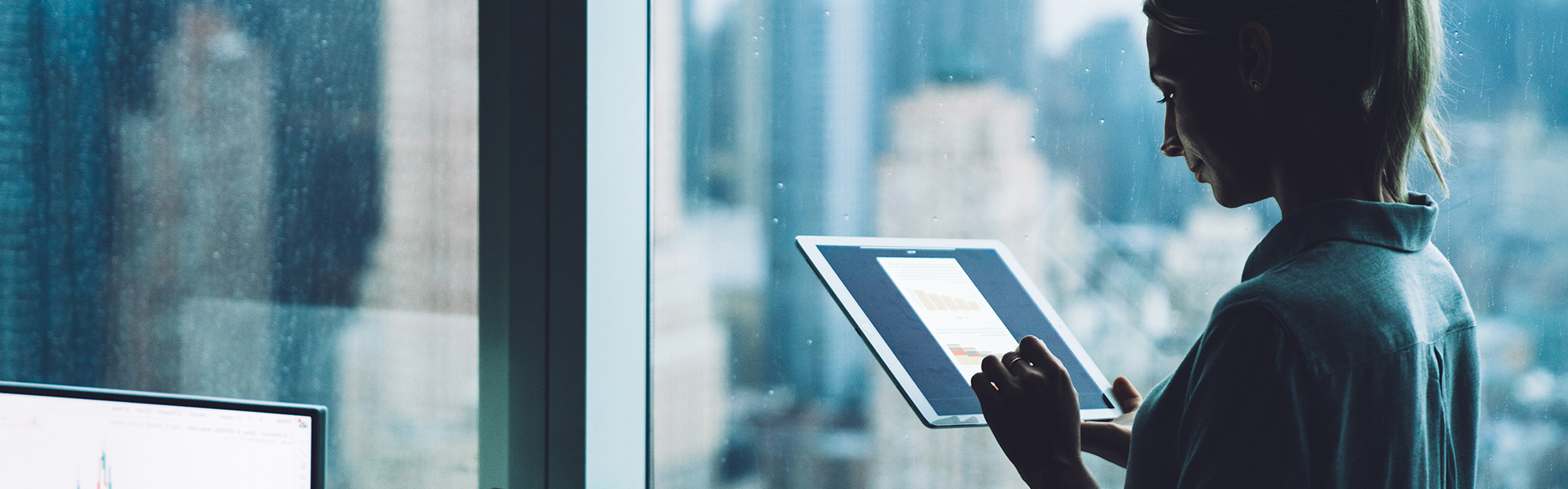 Woman looking at laptop